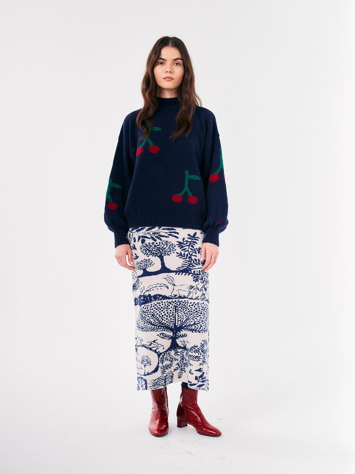 
                  
                    Navy Blue Cherry Printed Turtle Neck Jumper
                  
                