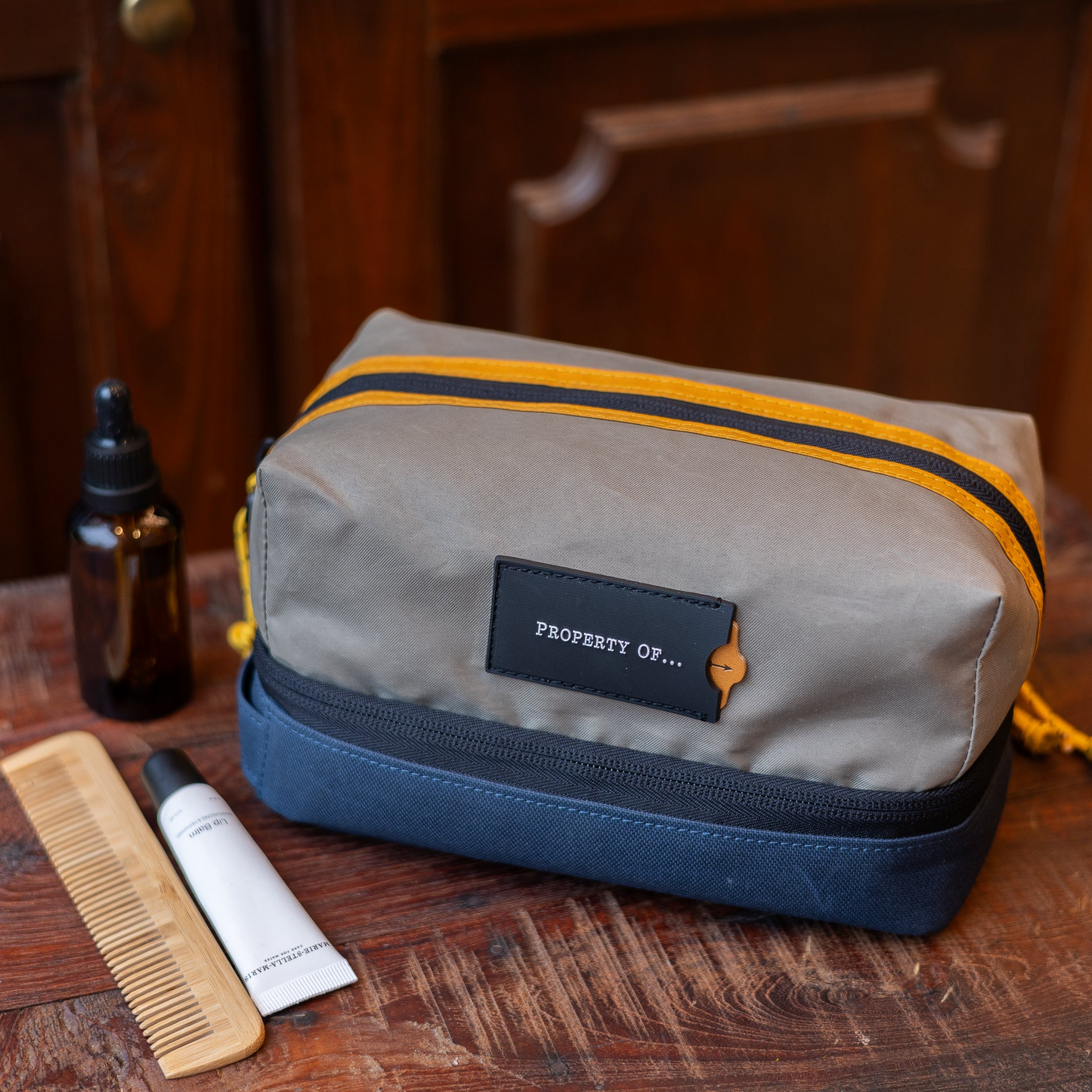 
                  
                    EVE Khaki Yellow Navy Wash Bag
                  
                