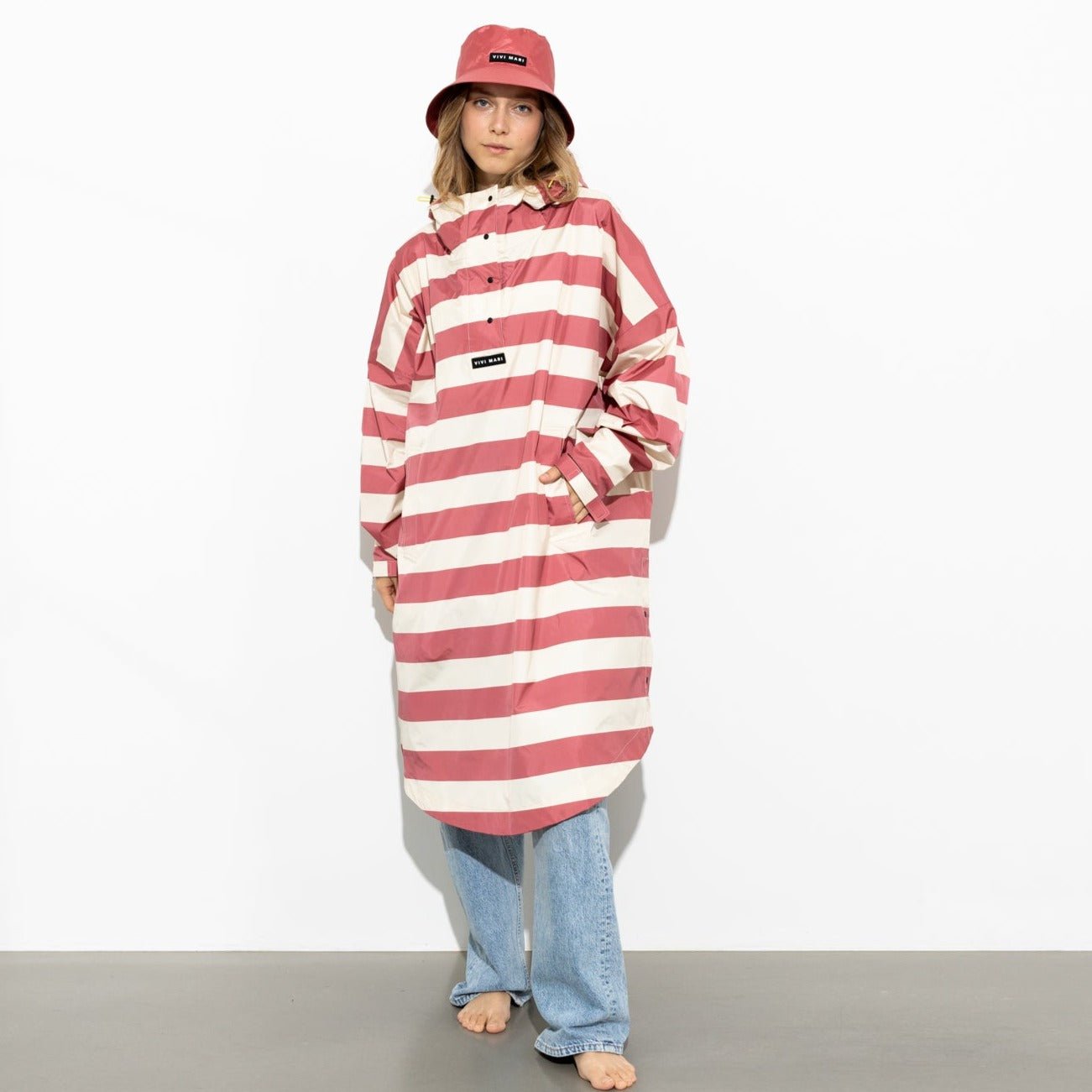 
                  
                    Blush Sand Bold Stripes Raincoat
                  
                