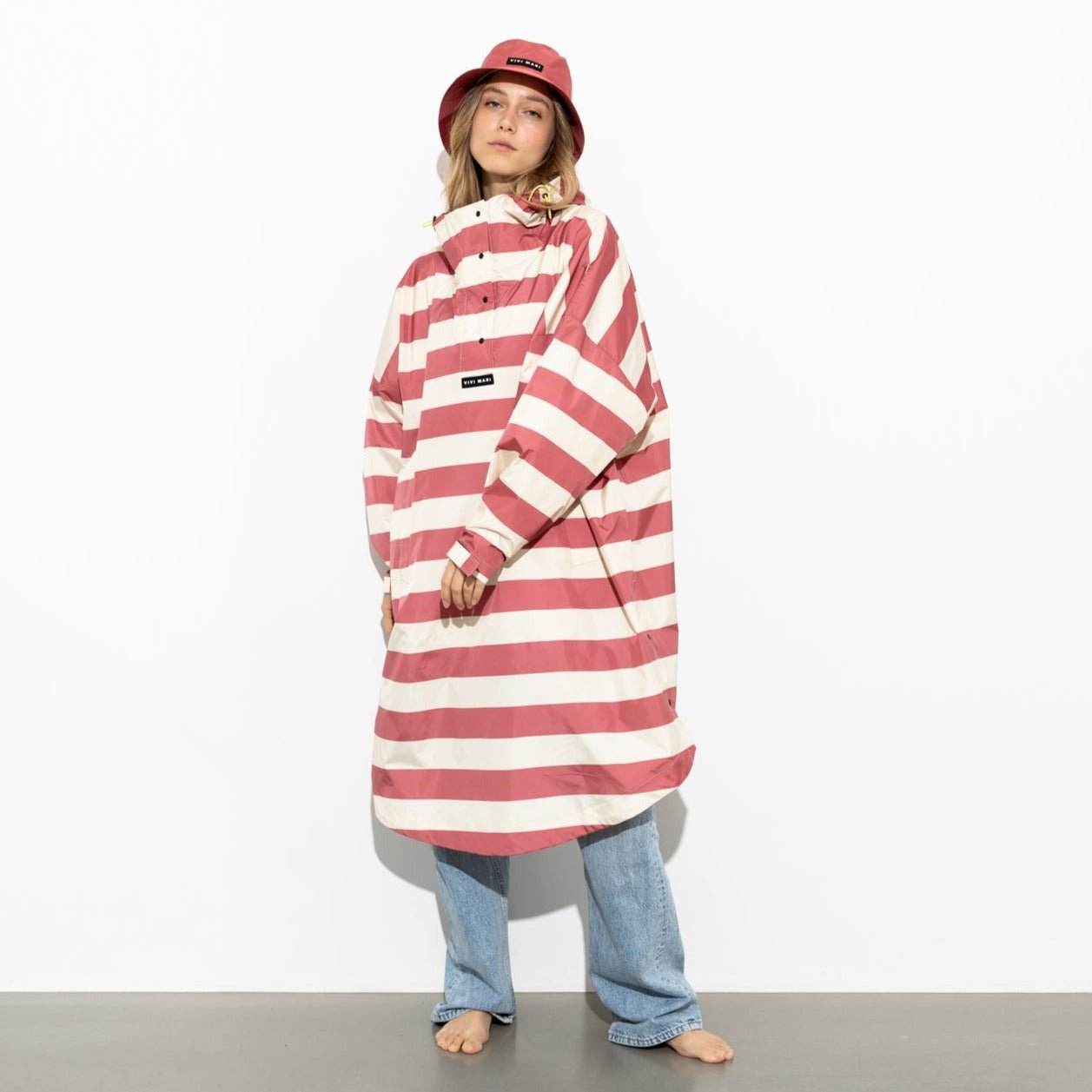 
                  
                    Blush Sand Bold Stripes Raincoat
                  
                