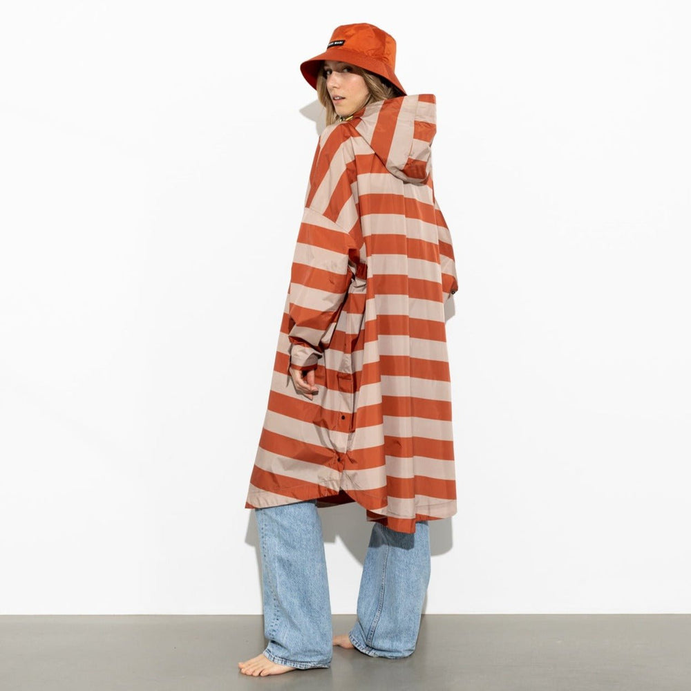 
                  
                    Cinnamon Latte Bold Stripes Raincoat
                  
                