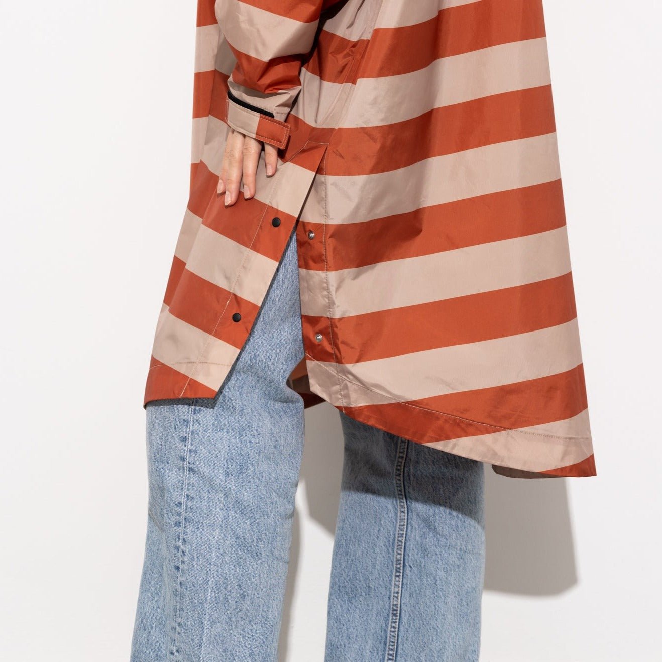 
                  
                    Cinnamon Latte Bold Stripes Raincoat
                  
                