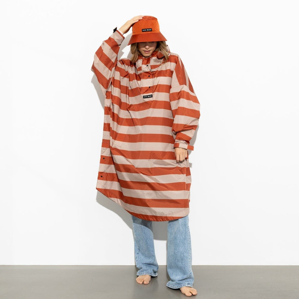 
                  
                    Cinnamon Latte Bold Stripes Raincoat
                  
                