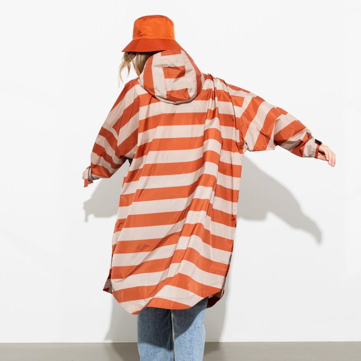 
                  
                    Cinnamon Latte Bold Stripes Raincoat
                  
                