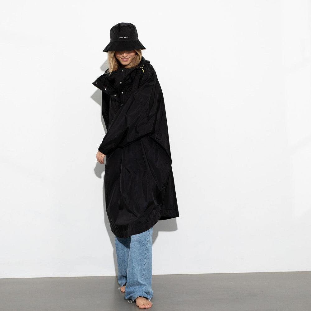 
                  
                    Black Solid Raincoat
                  
                