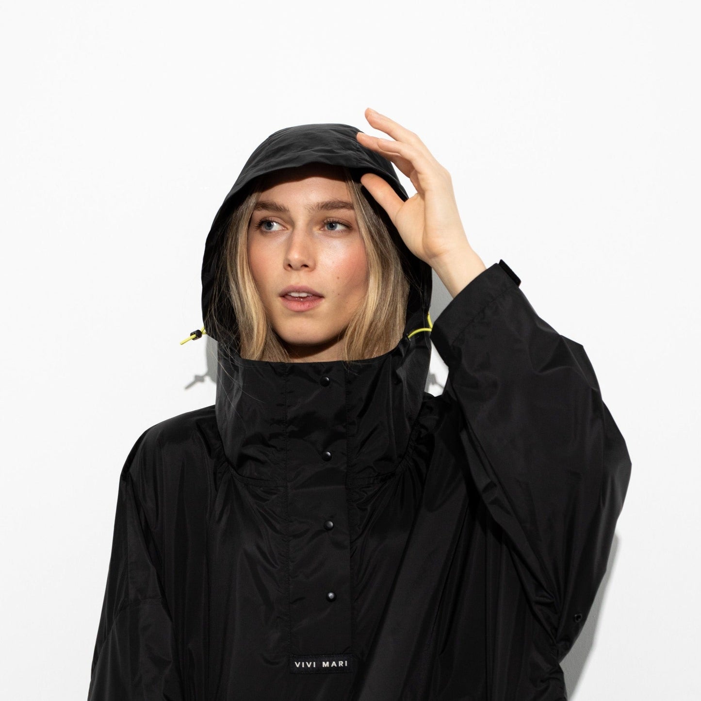 
                  
                    Black Solid Raincoat
                  
                