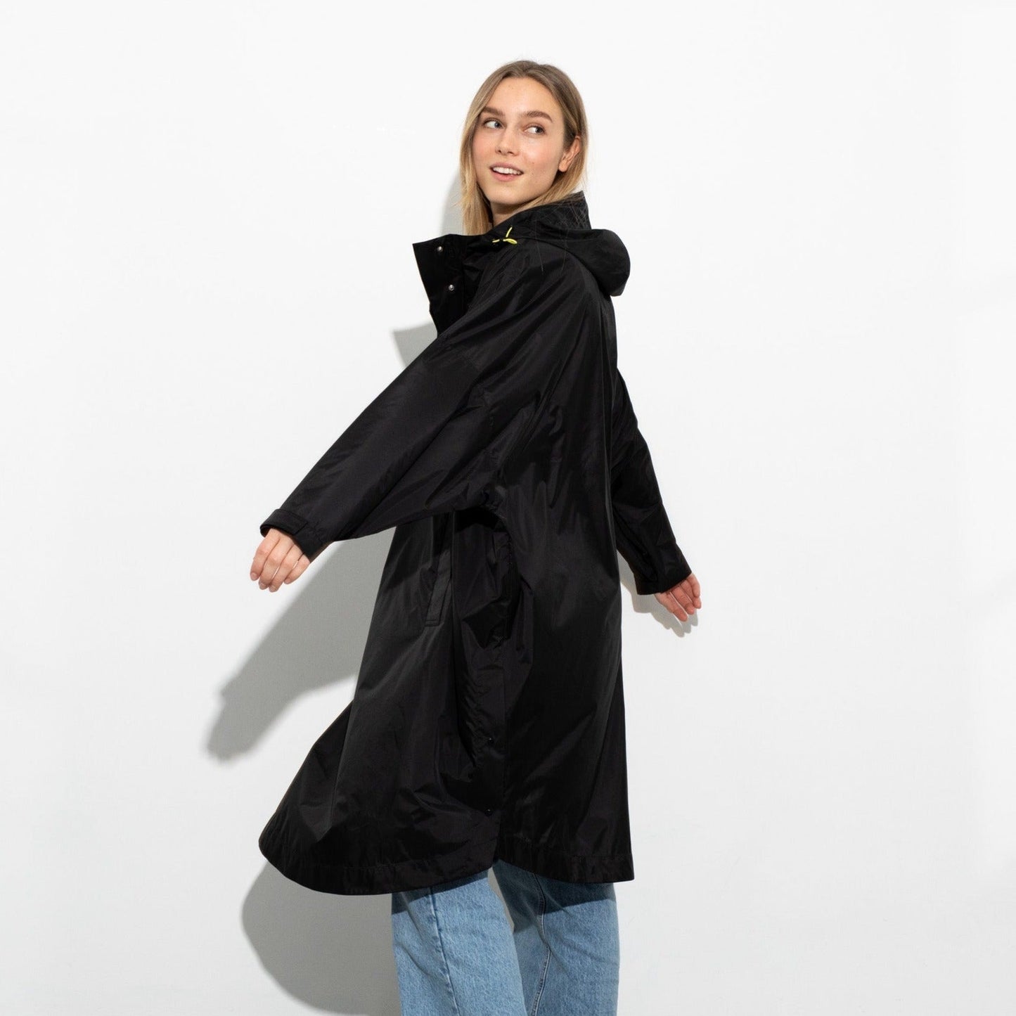 
                  
                    Black Solid Raincoat
                  
                